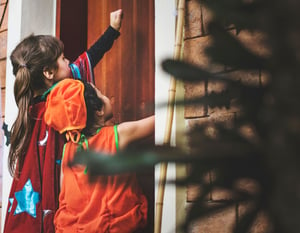 Trick or treaters knocking on door