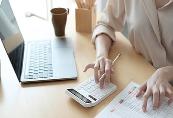 Using a calculator and paying bills